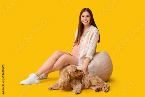 Smiling pregnant woman with...
