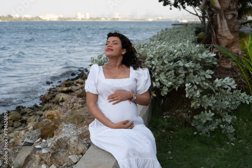 Contemplative Maternity by the Waterfront