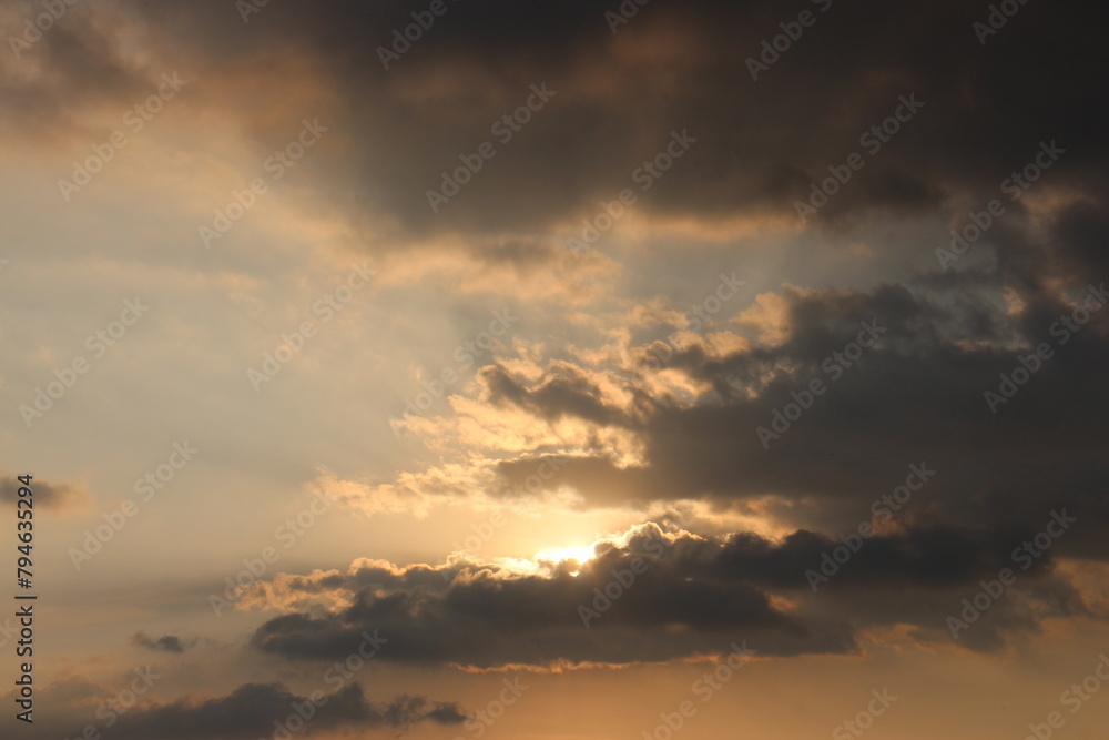 Colorful cloudy sky at sunset. Sky texture, abstract nature background. Colorful cloudy sky at sunset. Sky texture, abstract nature background.