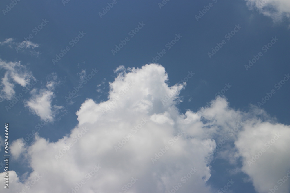 blue sky and white clouds. Freshness of the new day. Bright blue background. Relaxing feeling like being in the sky. blue sky and white clouds. Freshness of the new day. Bright blue background. Relaxing feeling like being in the sky.