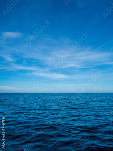 Fototapeta Naklejka Na Ścianę i Meble -  Landscape beautiful summer season vertical horizon look view tropical shore open sea cloud clean blue sky background calm nature ocean wave water nobody travel at Koh Muk Trang Thailand sun day time