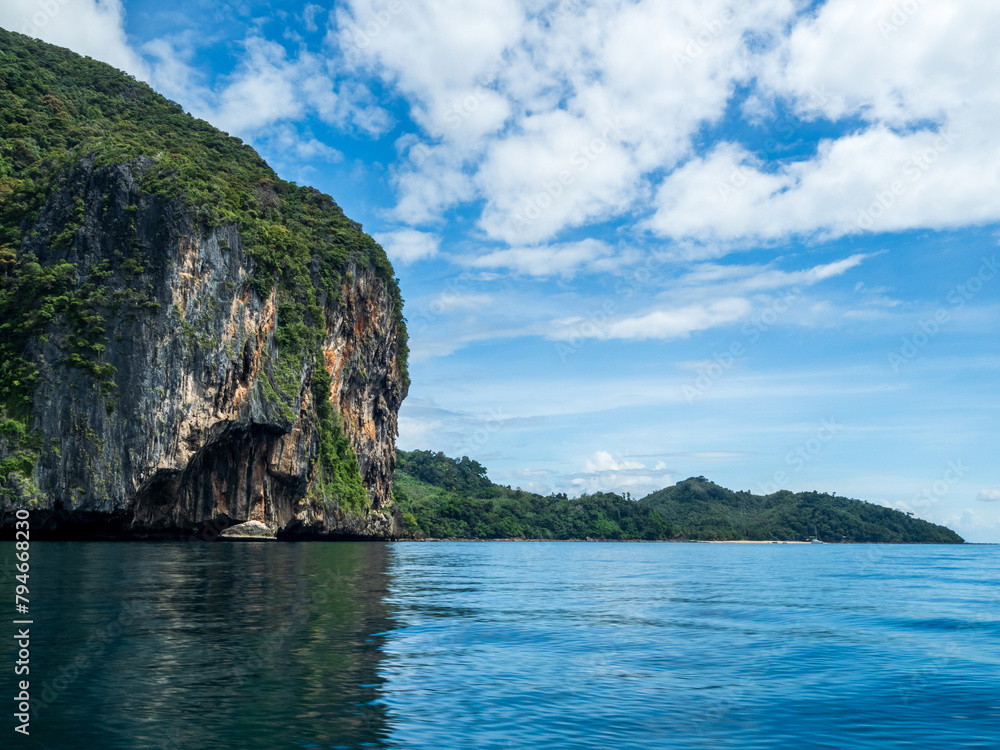 Landscape beautiful summer season vertical horizon look view island mountain tropical shore open sea cloud clean blue sky calm nature ocean wave water nobody travel Koh Muk Trang Thailand sun day time