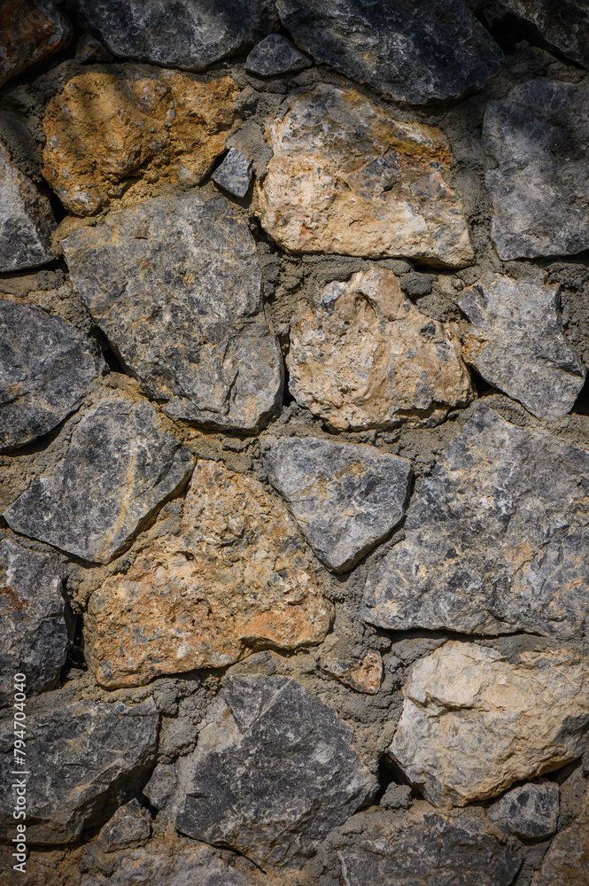 Stone wall texture. Decorative uneven cracked real stone wall surface. 3 Stone wall texture. Decorative uneven cracked real stone wall surface. 3
