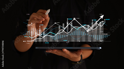 Investors' growth charts and investment analysis concepts of business growth, profit, development, and success Financial market graph presentation about stock market developments and profits.