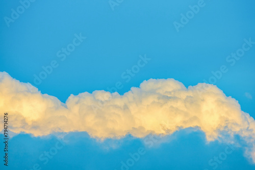 sun reflection on clouds  beautiful shape of cloud and blue sky for background  abstract texture for presentation template  sky blue wallpaper  concept of climate change  image with copy space