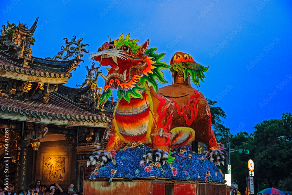Fototapeta premium The Baoan Temple’s Fire Lion Fireworks Show (fang huoshi) is the combination of an impressive display of beehive firecrackers and traditional paper arts.