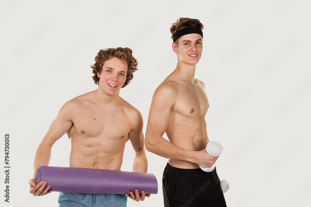 Gay couple. Two young attractive guys are playing sports. Gay couple. Two young attractive guys are playing sports.