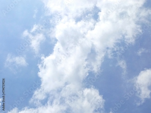 background of white clouds and bright blue sky