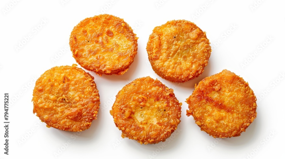 Top view of fried green tomatoes, tangy and tart, coated in cornmeal and fried until golden, isolated on a white background, studio lighting Top view of fried green tomatoes, tangy and tart, coated in cornmeal and fried until golden, isolated on a white background, studio lighting