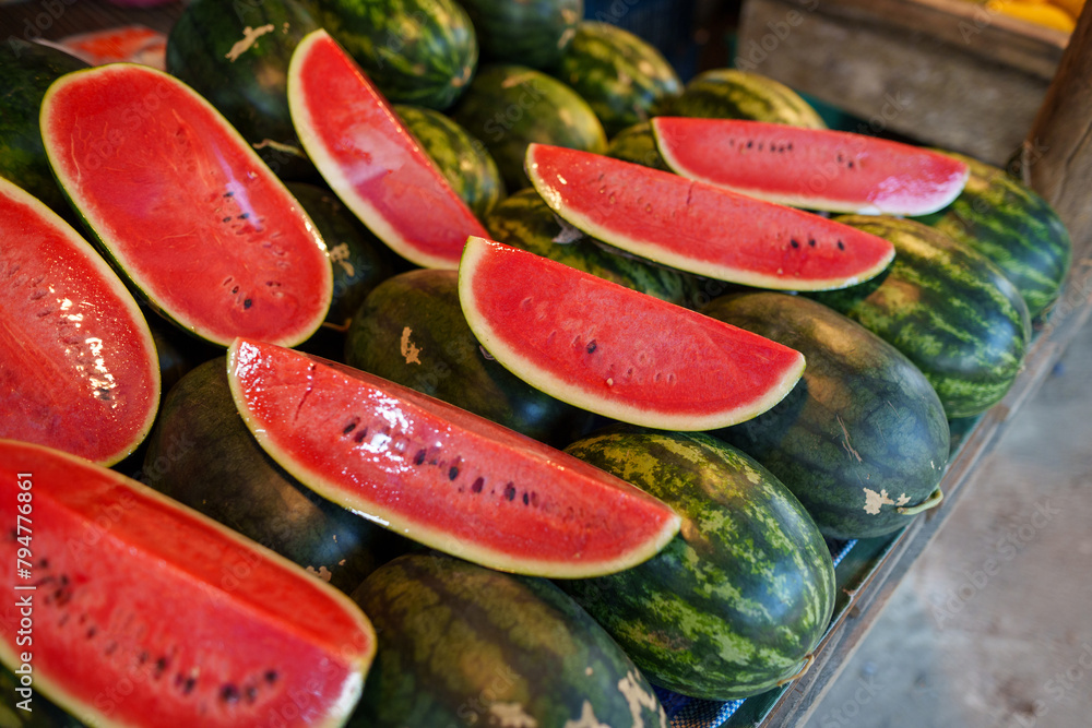 Watermelon for sale at local tropical fruit market Watermelon for sale at local tropical fruit market