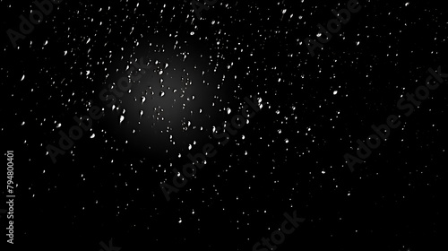  Various raindrops and white specks against black