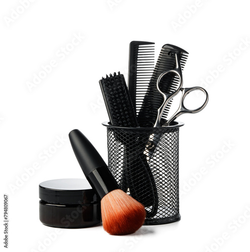 Professional hairdresser tools in cup isolated on white