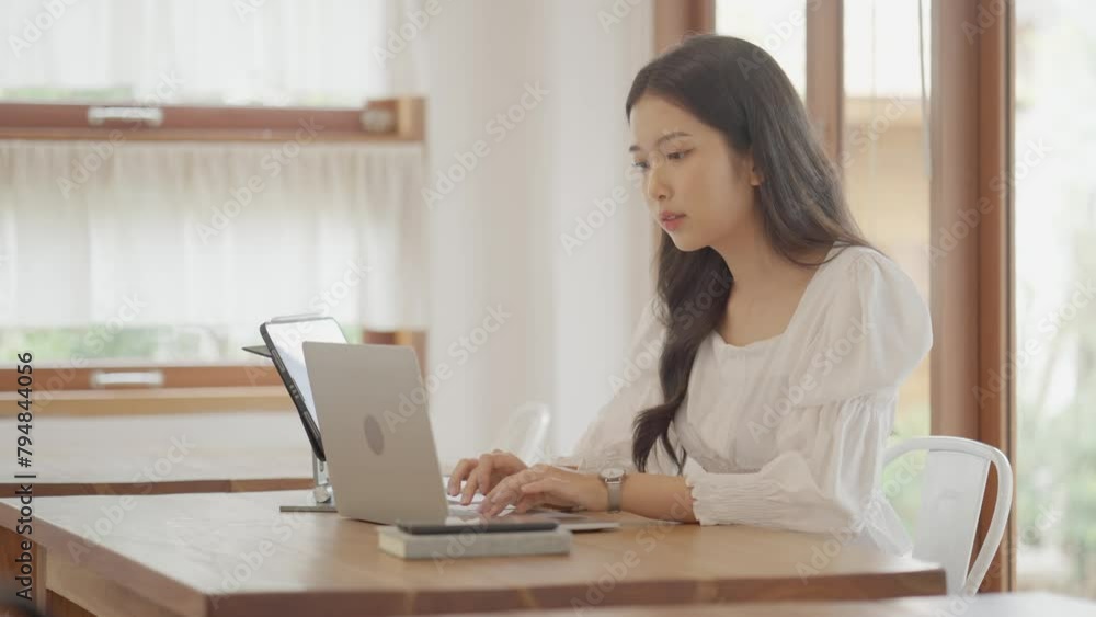 Asian woman using laptop, table and waiting at coffee cafe city break weekend balance lifestyle Asian woman using laptop, table and waiting at coffee cafe city break weekend balance lifestyle