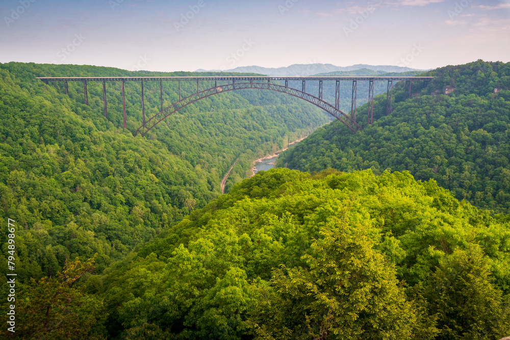 The New River Gorge Bridge, Steel arch bridge 3,030 feet long over the New River Gorge near Fayetteville, West Virginia, in the Appalachian Mountains of the eastern United States The New River Gorge Bridge, Steel arch bridge 3,030 feet long over the New River Gorge near Fayetteville, West Virginia, in the Appalachian Mountains of the eastern United States
