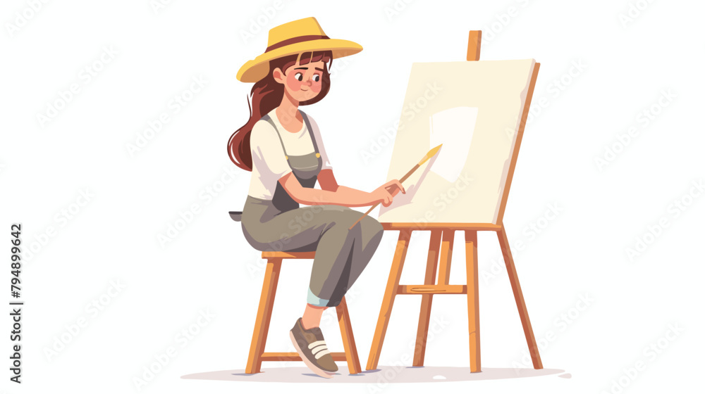 Confident young female painter drawing on a canvas 