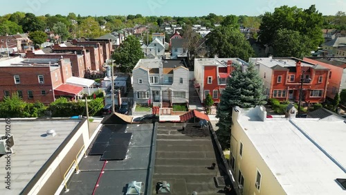 Descending Aerial Shot of Neighborhood Homes in Hollis Queens, NY photo