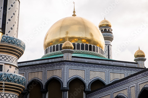 gold dome of Jame' Asr Hassanil Bolkiah Mosque in Brunei Darussalam on Borneo in Southeast Asia photo