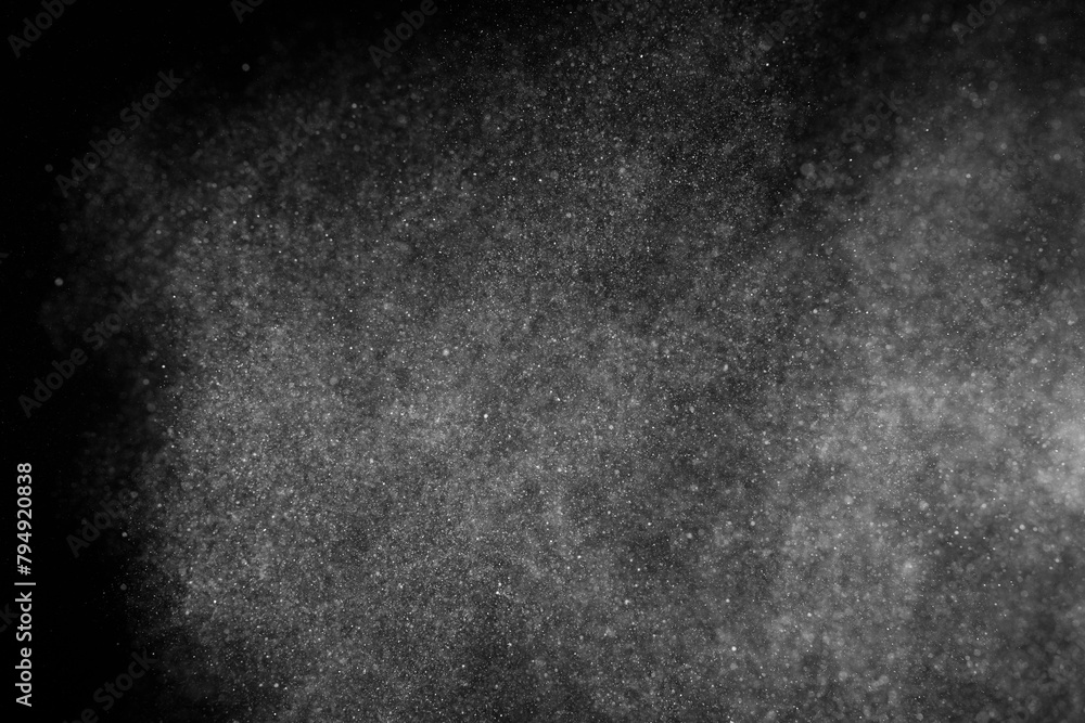 White texture on black background. Dark textured pattern. Abstract dust overlay. Light powder explosion.	
 - obrazy, fototapety, plakaty 