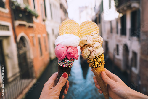 Fototapeta Naklejka Na Ścianę i Meble -  Delicious gelato or ice cream in waffle cone in Venice Italy.