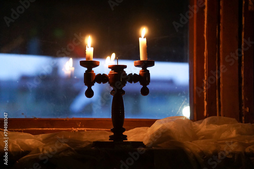 Candle light in the dark room at night
