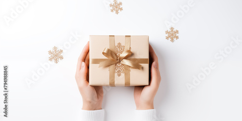 Christmas card template. Happy New year backdrop. Beautiful gift box in hands..