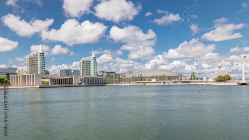 Panorama showing Parque das Nacoes or Park of Nations district timelapse in Lisbon, Portugal.
