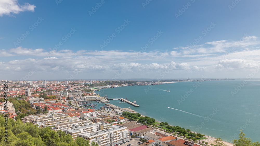 Panorama showing aerial view of marina and city center timelapse in Setubal, Portugal.