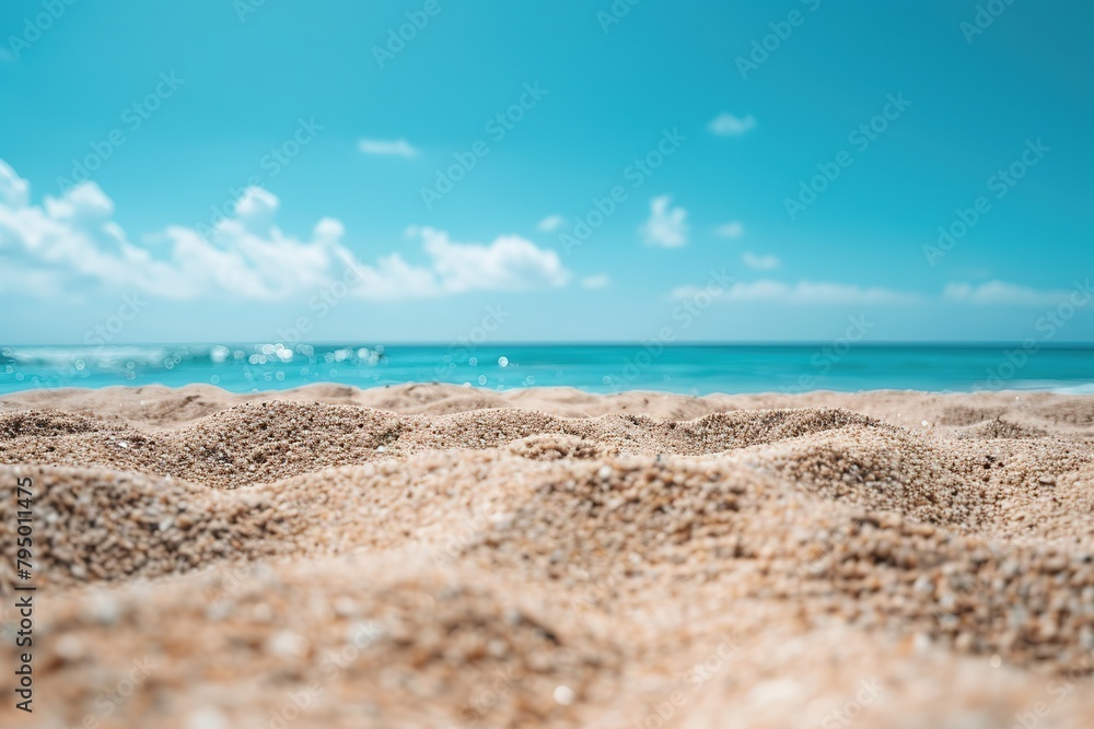 Close up of white sand on the beach with blue sky and sea background. Summer vacation concept, bokeh effect. Close up of white sand on the beach with blue sky and sea background. Summer vacation concept, bokeh effect.
