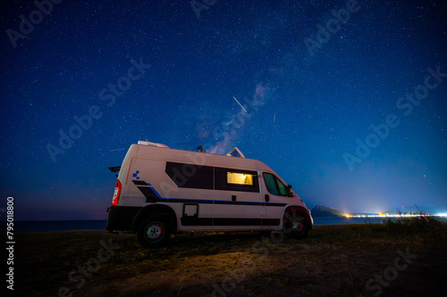 Campervan or motorhome parked on the beach in Greece. © _jure
