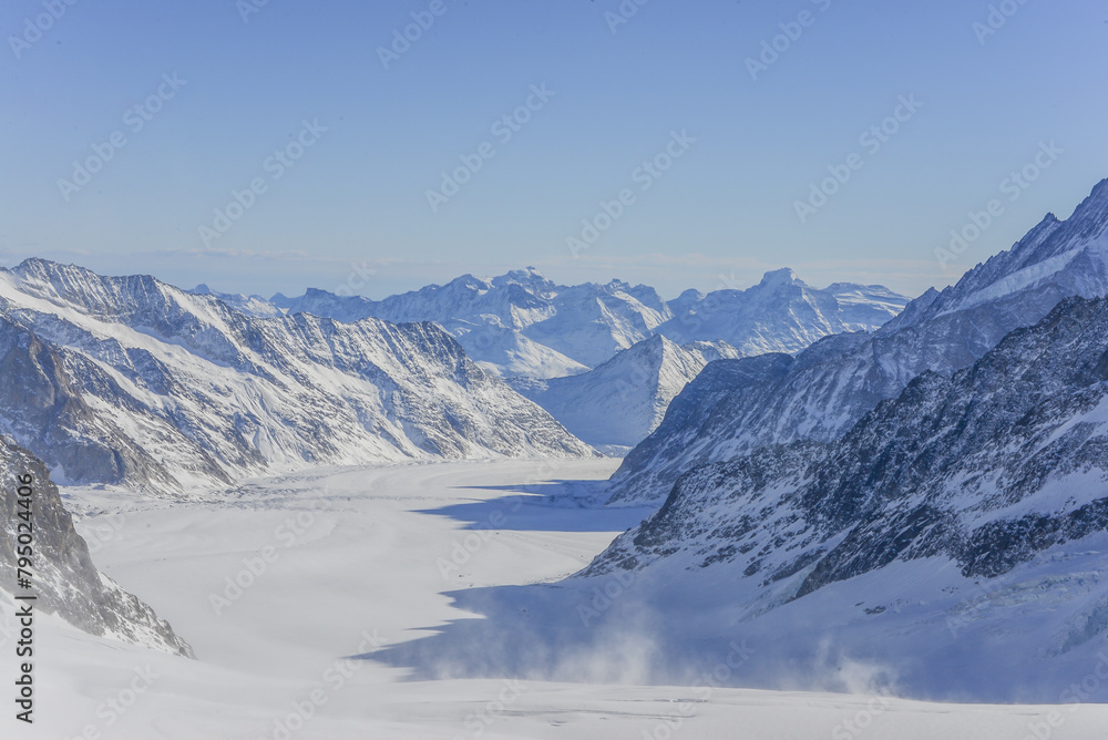 Obraz premium Landscape Views From Jungfrau Mountain Range And View Of The Large Aletsch Glacier Under Clear Sky, Switzerland