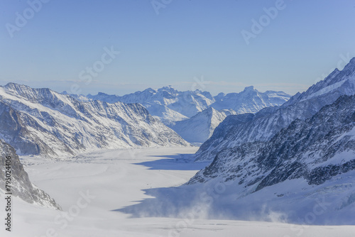 Landscape Views From Jungfrau Mountain Range And View Of The Large Aletsch Glacier Under Clear Sky  Switzerland