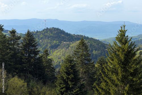 a radio tower in a hilly country