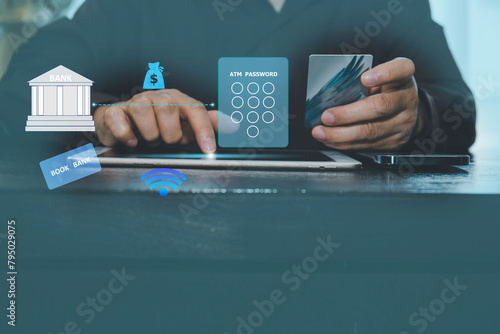 Online banking businessman using smartphone and tablet with credit card Transfer money, business in office concept. photo