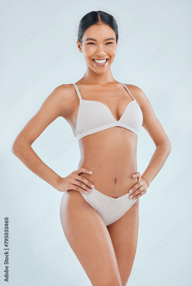 Obraz premium Portrait, woman and underwear in studio for cosmetics, cellulite and treatment by white background. Clean, smooth and collagen with female body for glow, skincare and wellness on mockup space