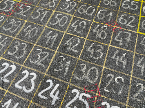 Counting Fun on the Playground. Chalk Numbers Galore. Train your brain, concept. Memory play. photo