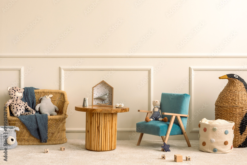 Obraz premium Warm and cozy kids room interior with wooden table, velvet blue, orange armchair, wooden blockers, plush animal toys, wicker basket, beige rug and personal accessories. Home decor. Template.