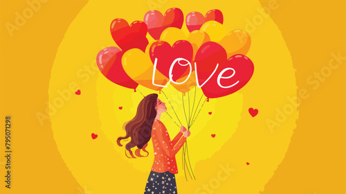 Happy young woman with air balloons in shape of word