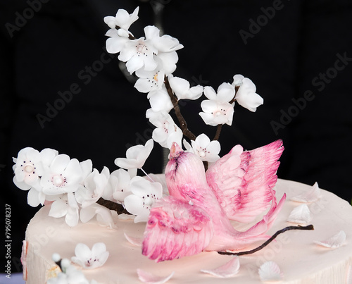 Spring cake with a branch and a bird