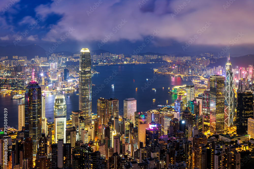 Hong Kong skyline cityscape with skyscrapers in downtown at night in Hong Kong, China