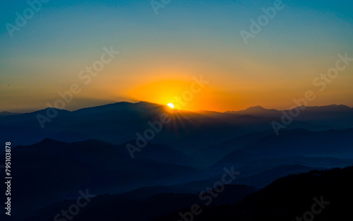 gloomy sunrise over mountains in Nepal. © gorkhe1980