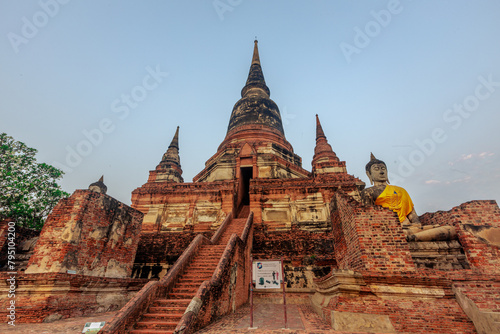 background of important religious tourist attractions in Ayutthaya Province of Thailand Wat Yai Chai Mongkol has an old Buddha image from the Krungsri period allowing tourists from all over the world