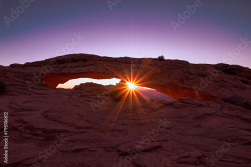 Sunrise at Mesa Arch in Canyonlands National Park  photo