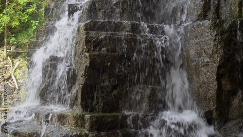 waterfall on square shaped rock