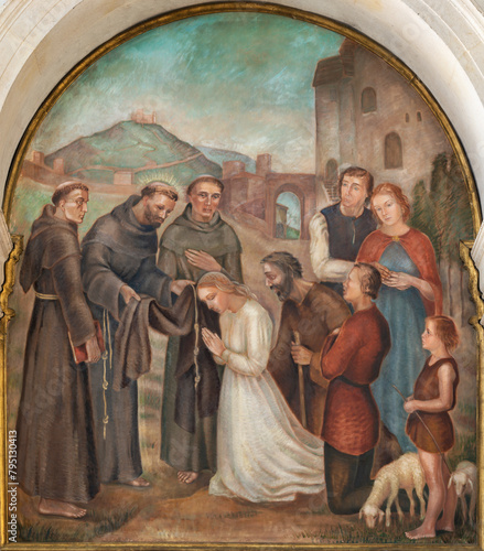 VICENZA, ITALY - NOVEMBER 5, 2023: The painting St. Francis of Assisi at the ordination of st. Clara in year 1212 in the church Chiesa di San Lorenzo by I. Barbieri form 20. cent.