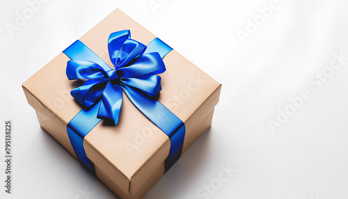 Gift box with blue bow on white background. International Women's Day celebration