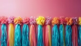 Colorful Streamers on Pink Wall