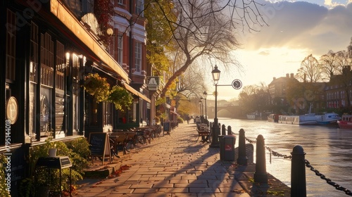 A tranquil riverside promenade lined with charming cafes and stately buildings, its serene atmosphere and scenic views perfect for leisurely strolls and quiet contemplation. photo