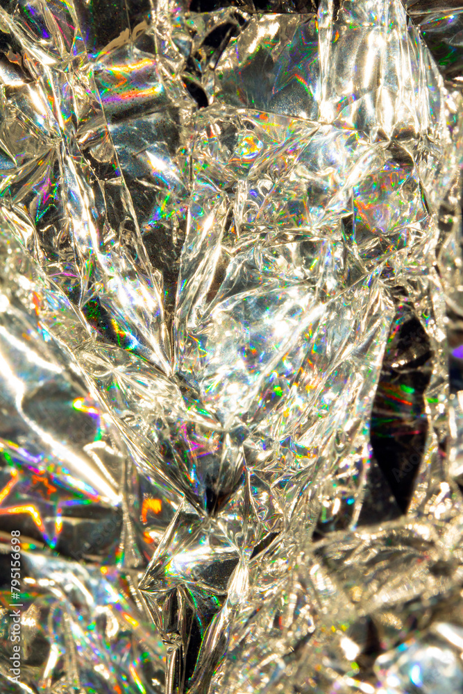 Fototapeta premium Holographic Crumpled Gold Bronze Paper Material which is Shiny for Background