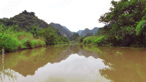 Hoa Lu, Ninh Binh, Vietnam: Sailing in a row boat by the Red River Delta