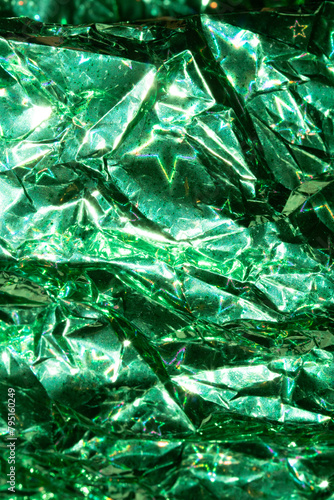 Holographic Crumpled  Green Paper Material which is Shiny for Background